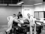 Gerry Beisel, Bill Woodward & Tom Monk (l-r) in the weapons bay in Bldg 275 working on B-61's. 
