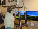 Steve Bisel tries his hand at the interactive flight simulator