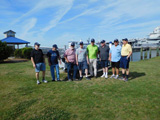 Group photo at Patriot's Point: Wayne Miller, Bill Woodward, Steve Bisel, Steve Carr, Paul Baker, Bob Mosley, Gary Palmer and Bob Strand (L-R)
