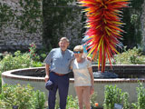 Bob and Joan pose by the Chihuly sculpture