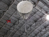 Mark 61 hanging from the ceiling with chute extended