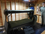 Display of basic training bunk and footlocker from our generation