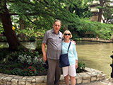 Paul and Jan Baker pose by the river