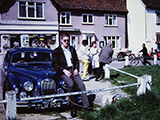 John Ging sitting on Chuck Berchtold’s Jaguar in Finchingfield.